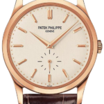 Rose gold Patek Philippe wristwatch with a white dial, rose baton markers, and brown alligator strap.