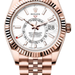 Rose gold Rolex Sky-Dweller watch with white dial and fluted bezel, date window at 3 o'clock, jubilee bracelet