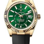 Rolex Sky-Dweller watch with green dial, gold case, black strap, and date window at 3 o'clock.
