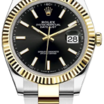 Rolex Oyster Perpetual Datejust wristwatch with a black dial, gold fluted bezel, and two-tone stainless steel and yellow gold bracelet showing the date at 3 o'clock.
