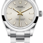 Rolex Oyster Perpetual stainless steel wristwatch with a silver dial and gold hands/markers.