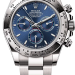 Rolex Daytona stainless steel watch with blue dial, three subdials, and tachymeter bezel on a metal bracelet.