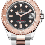 Rolex two-tone Yacht-Master watch with rose-gold bezel, black dial, date window at 3, and steel-and-rose-gold bracelet