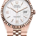 Rose gold Rolex wristwatch with a fluted bezel, Jubilee bracelet, and honeycomb white dial with date at 3 o'clock.