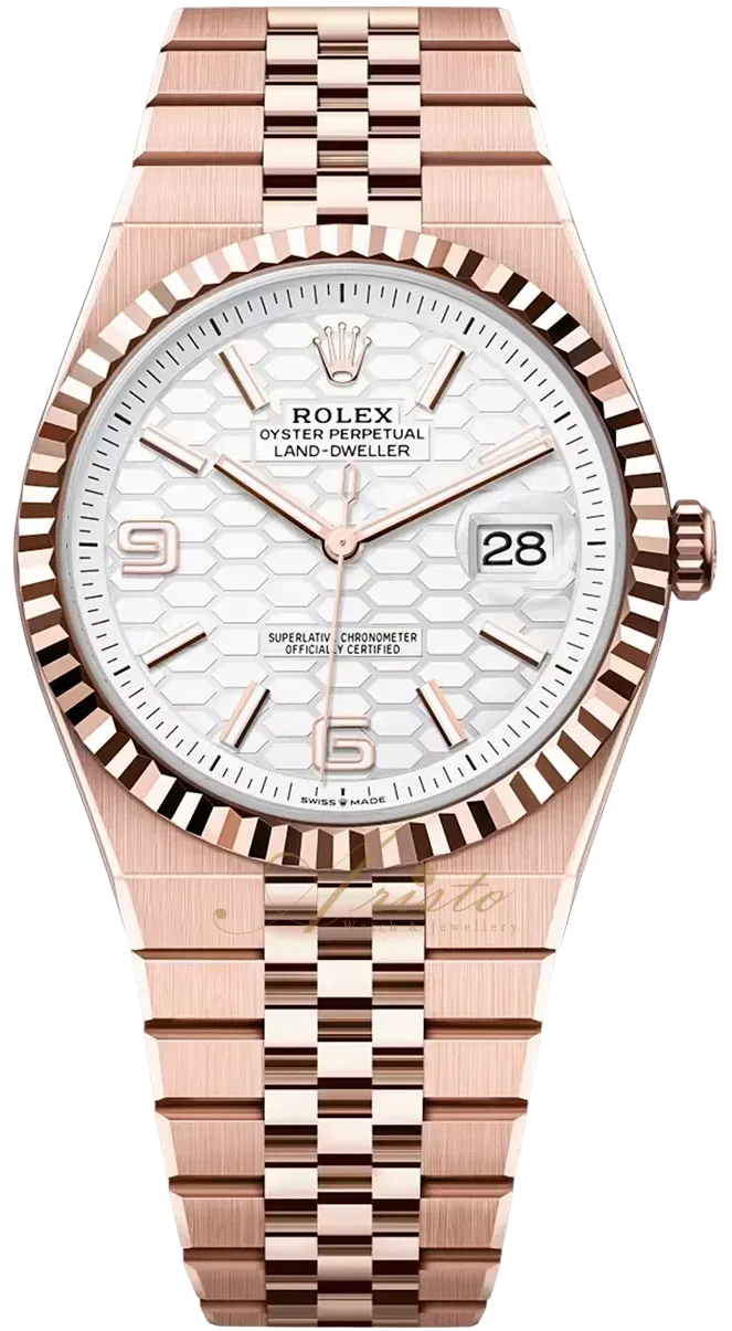 Rose gold Rolex Oyster Perpetual Land-Dweller wristwatch with a honeycomb white dial and date window at 3.