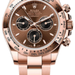 Rose gold Rolex chronograph with brown dial, three subdials, and tachymeter bezel on a matching bracelet.