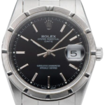 Rolex Oyster Perpetual Date stainless steel wristwatch with black dial and date magnifier showing 5.