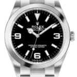 Rolex Oyster Perpetual Explorer wristwatch with black dial, silver hour markers, and a stainless steel bracelet.