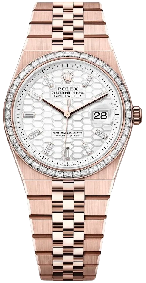 Rose-gold Rolex Oyster Perpetual Land-Dweller watch with a diamond-set bezel and white patterned dial showing date at 3 o'clock.