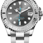 Rolex Yacht-Master stainless steel wristwatch with grey dial, date window at 3, blue seconds hand, and raised bezel.