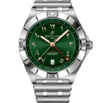 Breitling GMT luxury wristwatch with a green dial, gold hands, and stainless steel bracelet.