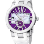 White metal wristwatch with a purple dial, Roman numerals, date window at 2 o'clock, and a small circular seconds indicator in the center.