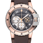 Harry Winston wristwatch with a rose-gold case, brown leather strap, and three chronograph subdials with a date window.