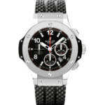 Hublot chronograph watch with stainless steel case, black dial, white numerals, and textured black strap.