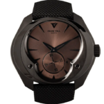 Franc Vila Genève wristwatch with a bronze-brown dial, dark metal case, and black fabric strap.