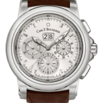 Carl F. Bucherer chronograph watch with white dial, three subdials, large date window, stainless steel case, brown leather strap.