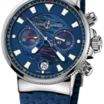 Ulysse Nardin blue dial chronograph watch with white hour markers and a blue textured strap. Includes date window at 6 o'clock and three subdials.