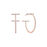 Rose-gold diamond-studded letter F beside a diamond-encrusted hoop earring on a black background