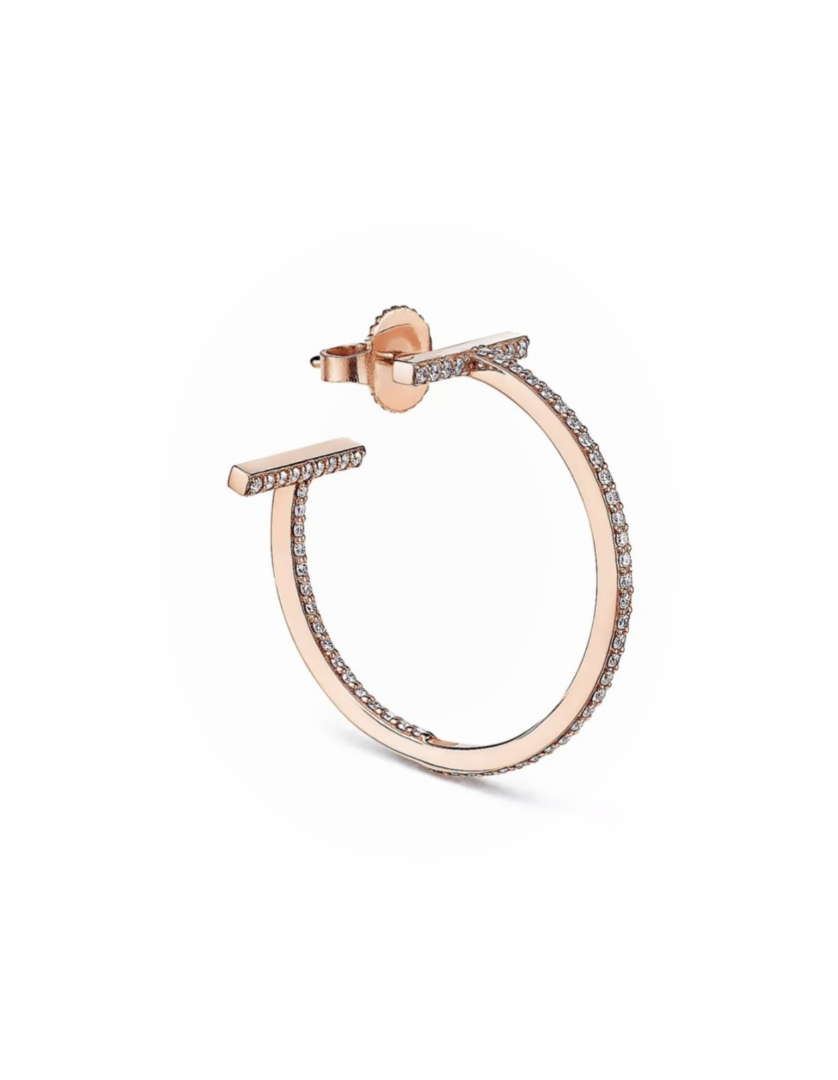 Rose gold open hoop earring with pavé diamonds along the outer edge and a hinge clasp.