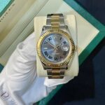 Two-tone Rolex Datejust in green box, silver dial with Roman numerals and date at 3 o'clock (15)