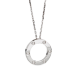 Silver circular pendant with six small diamonds set around the ring, on a delicate silver chain.