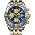 Two-tone Breitling chronograph watch with a blue dial and gold subdials